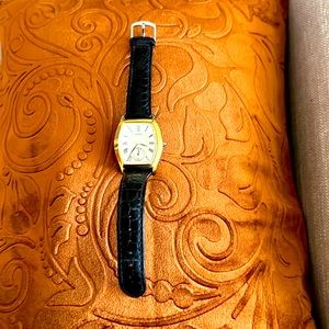 Seiko Vintage 1990’s Gold Watch w/dark brown alligator band.